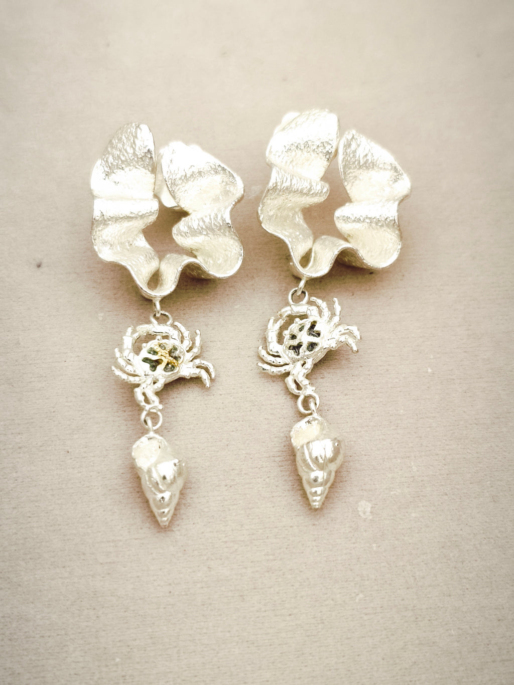 163 Aretes Marea